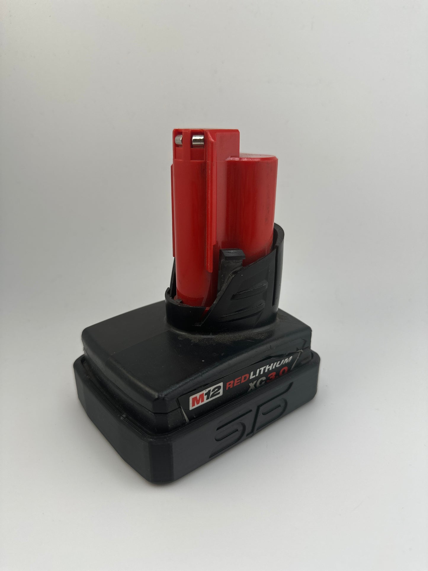 STS Auto Design MW12XC – Milwaukee M12 XC Magnetic Battery Cover